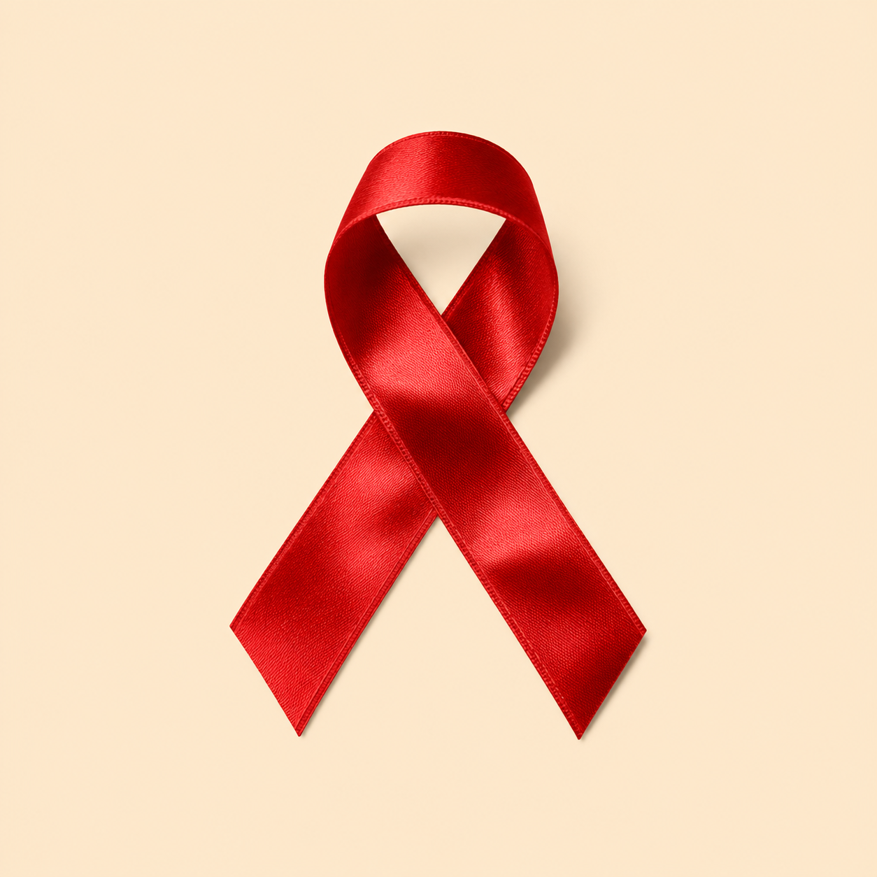 Ruban rouge de sensibilisation, symbole du don solidaire My Self Key reversé aux associations contre les violences faites aux femmes